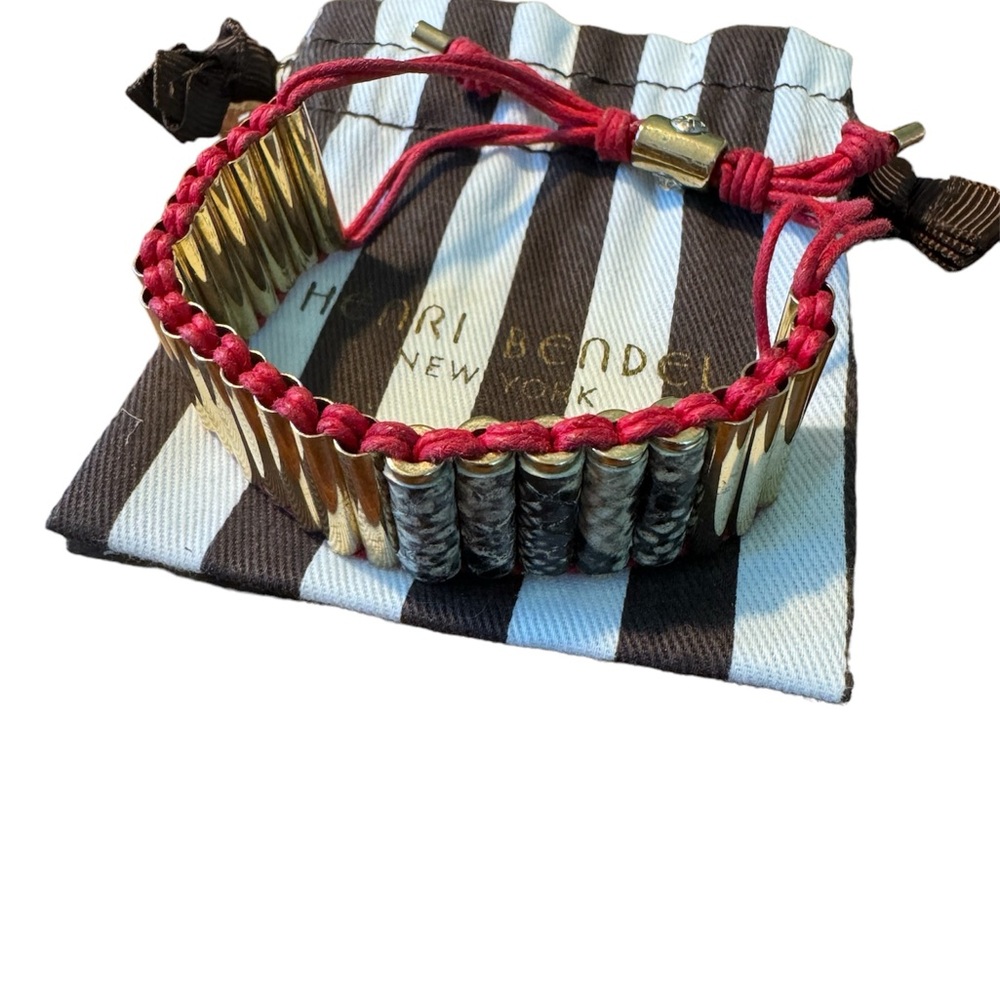 Henri Bendel gold tone and animal print adjustable bracelet